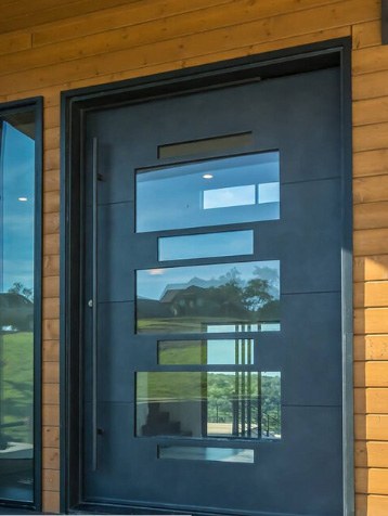 Black finish front door with square top and windows of varying sizes