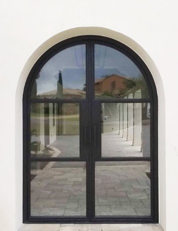 Large round top double doors with black finish iron